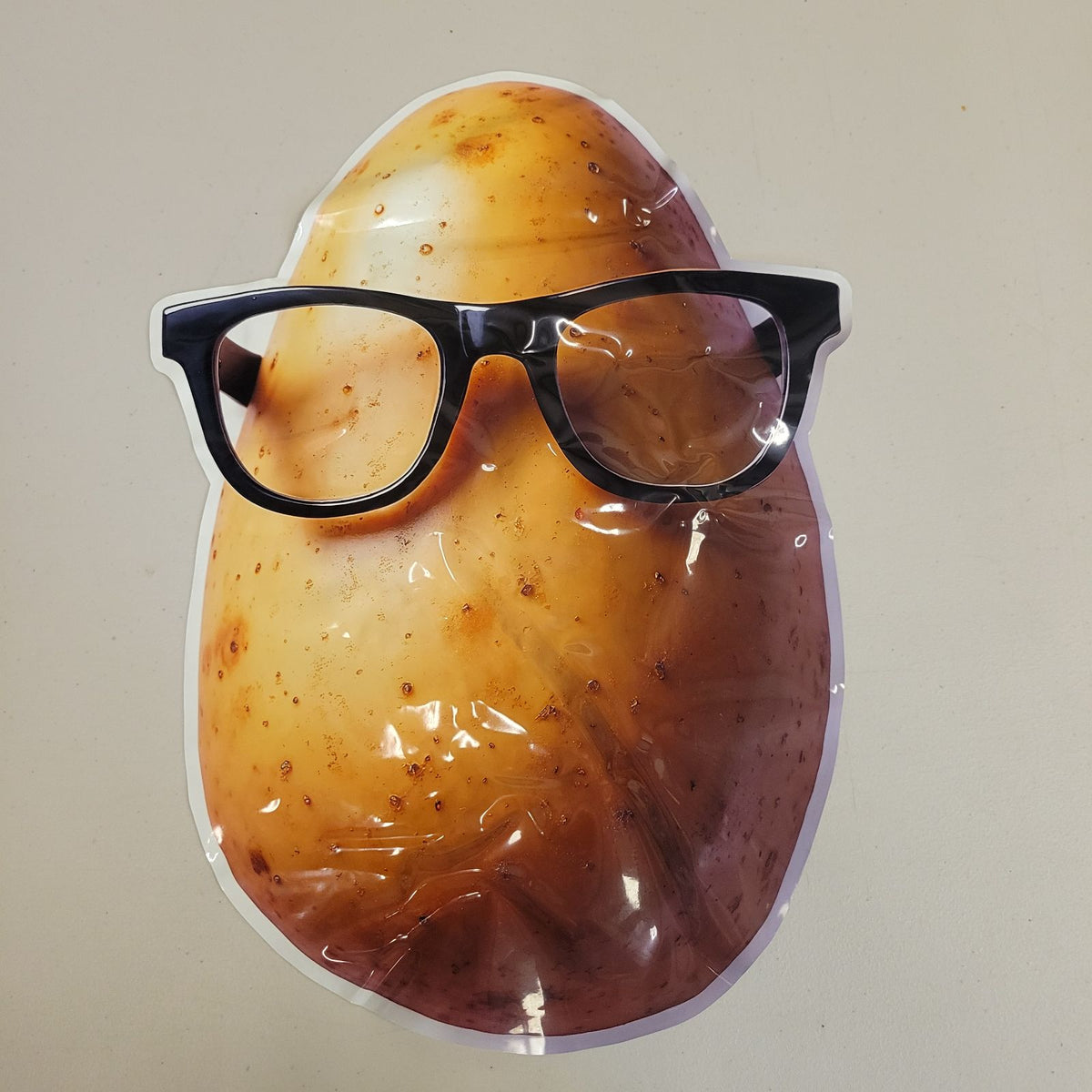 Potato Defense Fund swag illustration of a potato character wearing sunglasses
