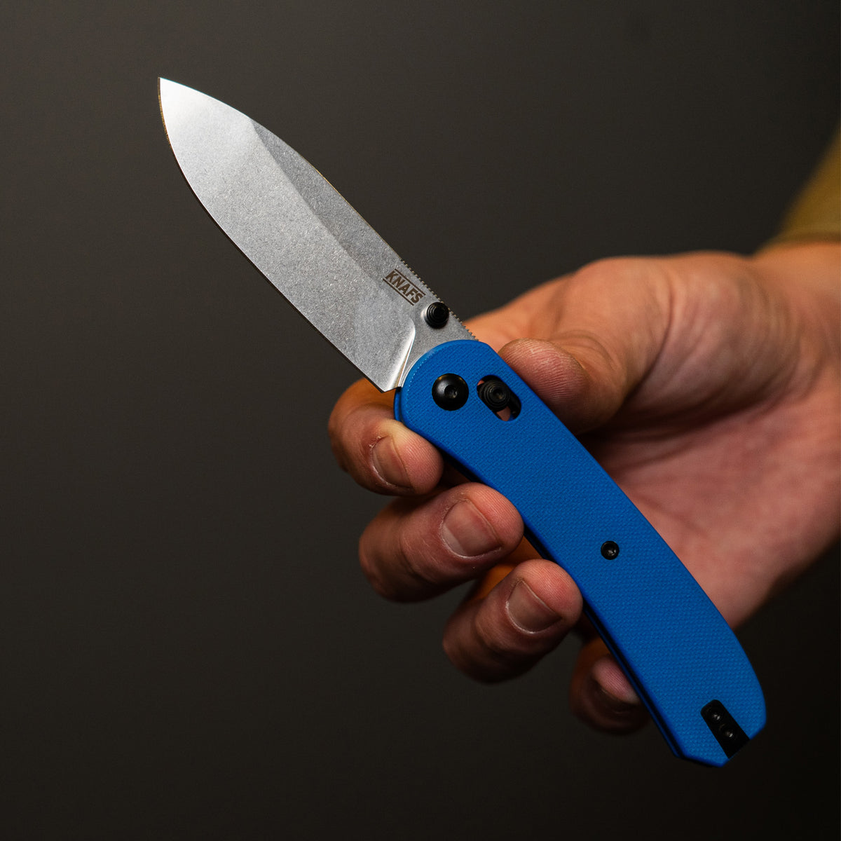 Lander 2 Pocket Knife in Blue G10, open, black blade, standalone product shot on dark background