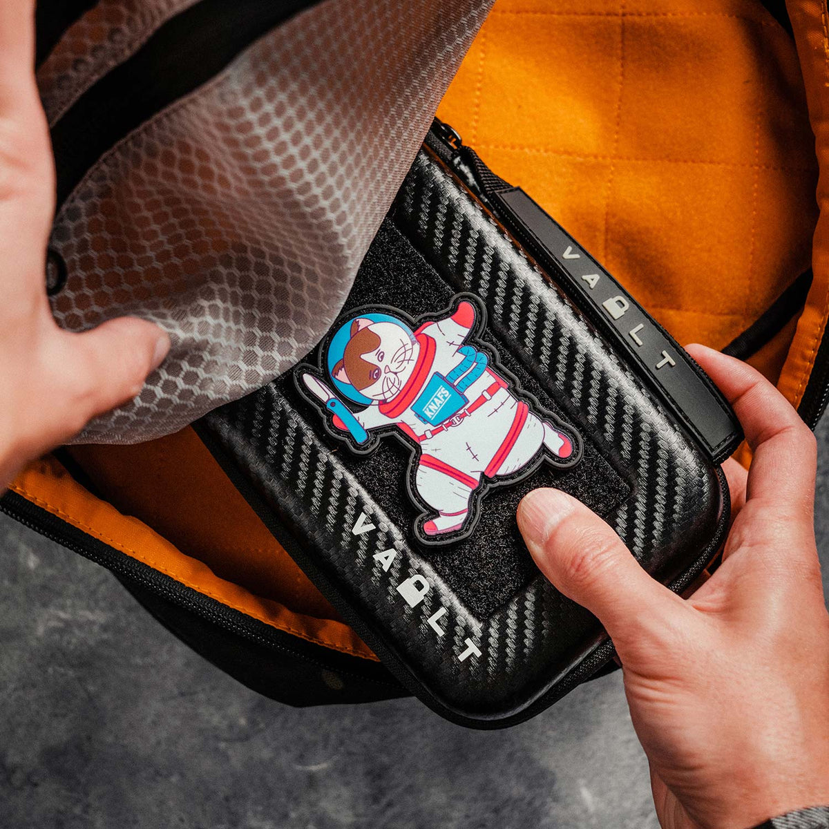 Knafs x Vault Case NANO Knife EDC Case held in hand outdoors