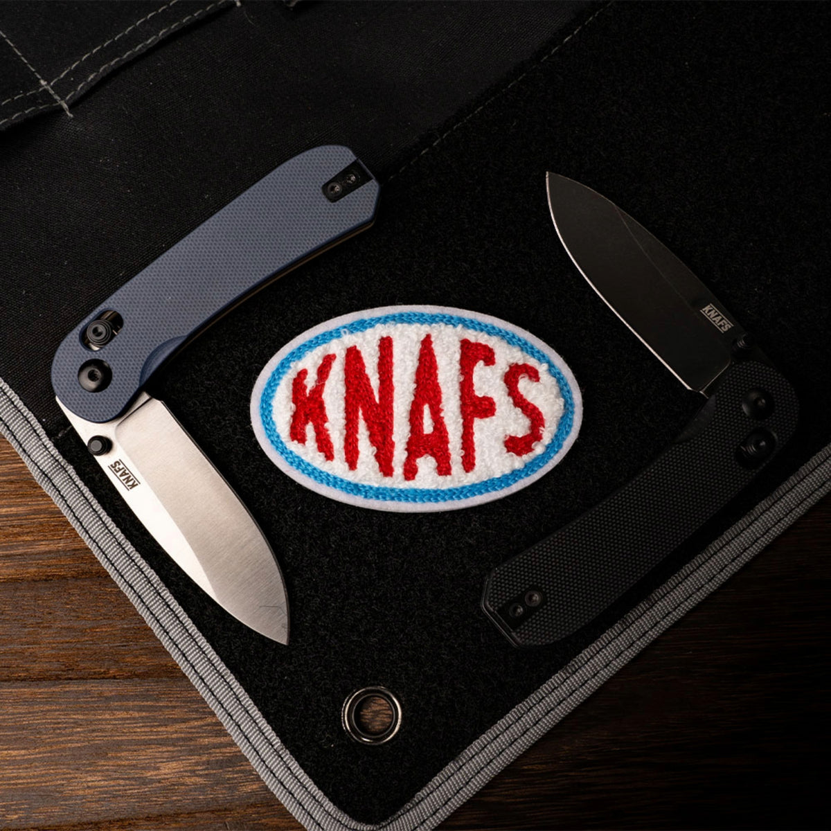 Knafs Americana Chenille Patch, a red white and blue round patch with Knafs text, shown on a bag