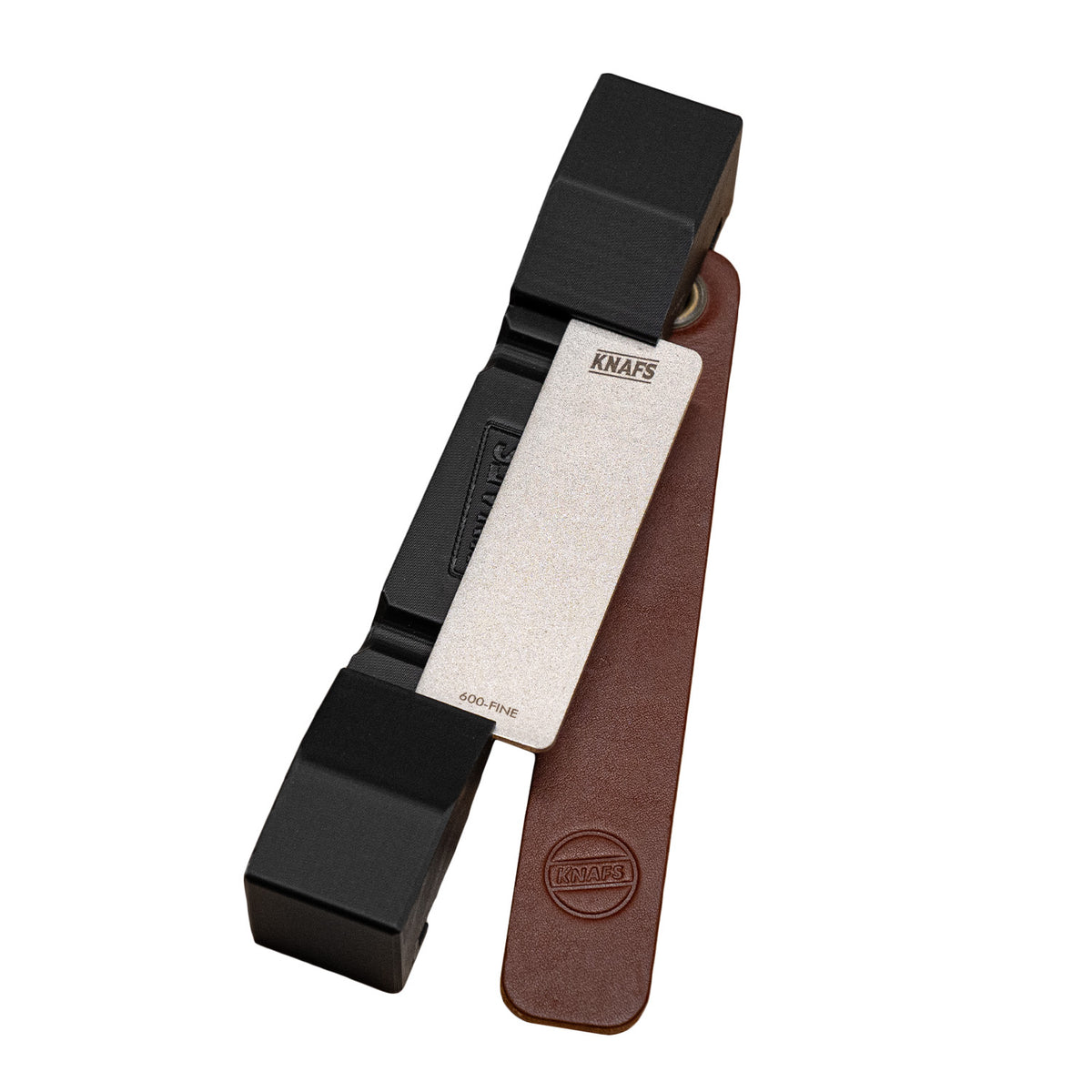 Docking Station sharpening guide loaded onto a knife blade for angle-consistent sharpening