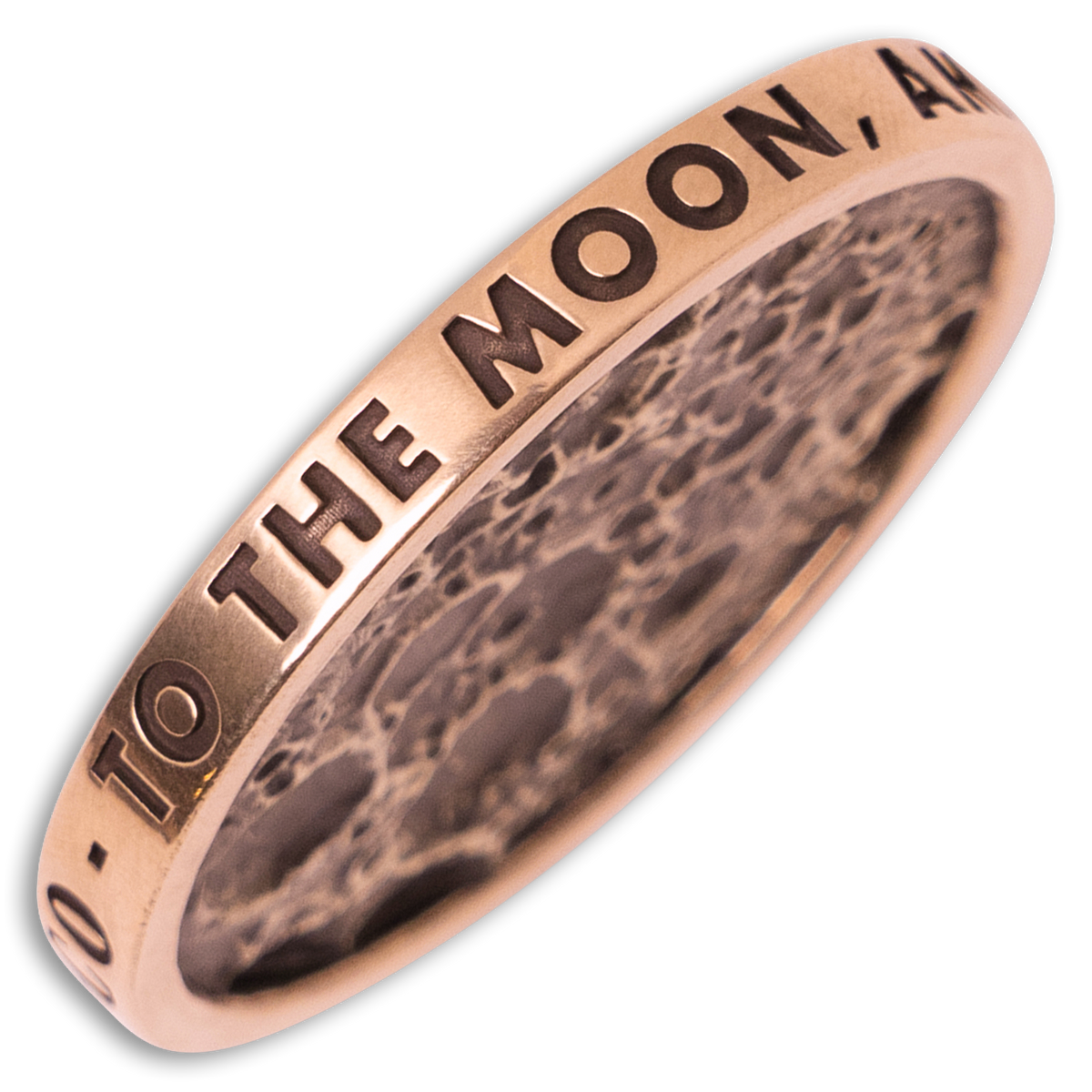 A rose gold band ring with a hammered interior and engraved text reading 'TO THE MOON, AND' on the outer surface, shown on a plain white background.