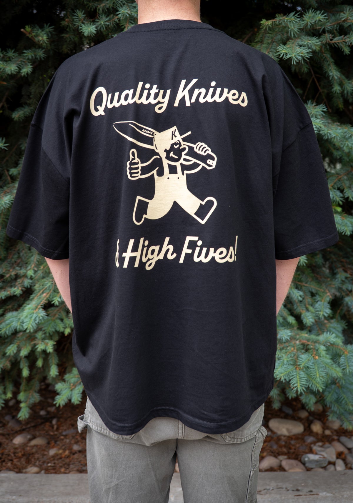 Man wearing black Knafs Quality Knives and High Fives t-shirt, back view