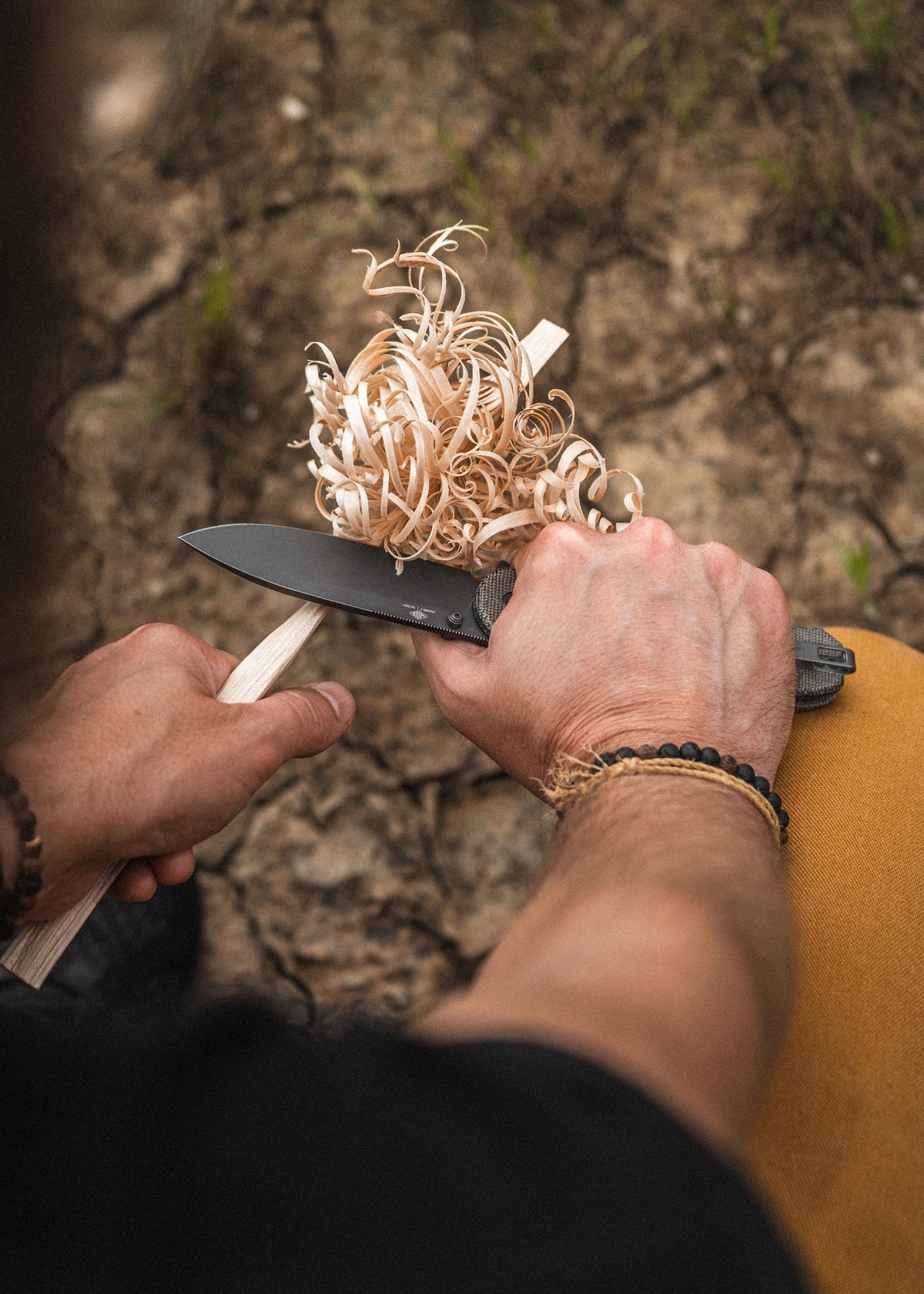 Hand sharpening Lander 7 pocket knife with Moondust micarta handle outdoors