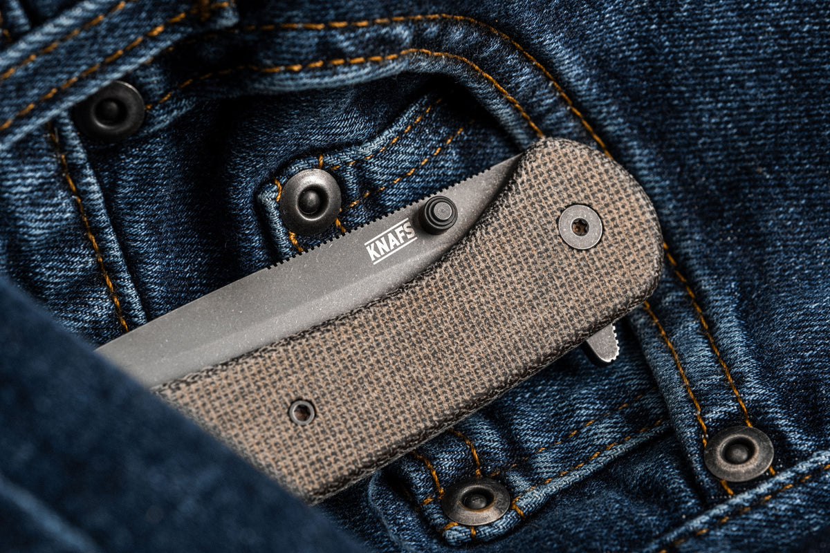 Lander 7 pocket knife with Moondust micarta handle clipped inside jeans pocket