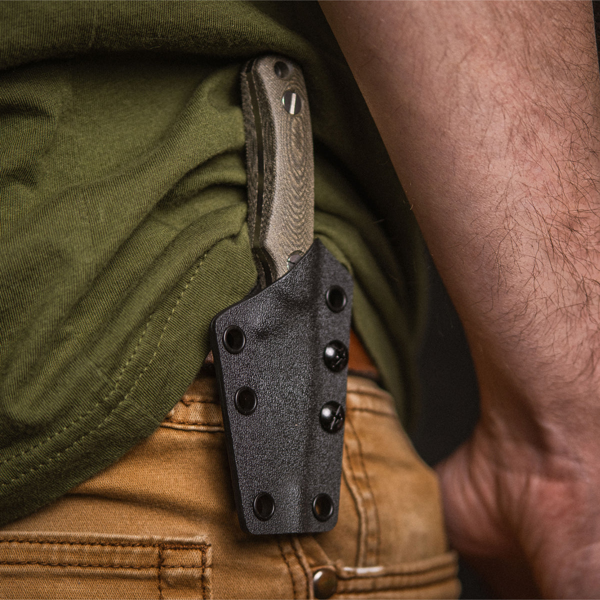 Little Lulu knife in sheath worn in hip carry position
