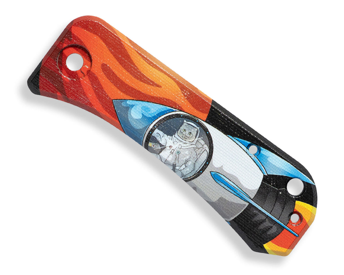 Mars Kitty Banter Scales Version 2.0, orange and red galaxy-pattern knife scales on a closed folding knife, front view