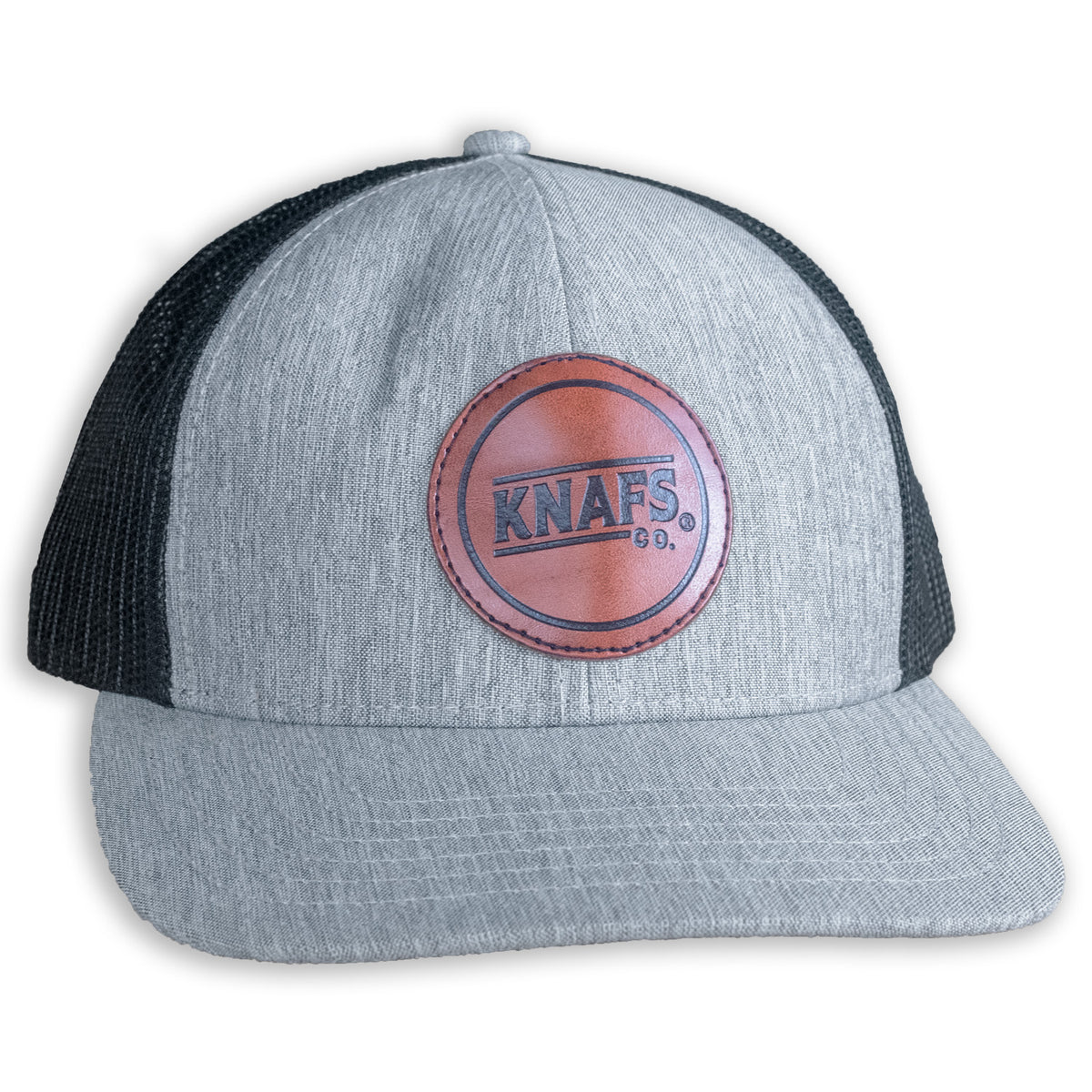 Knafs Trucker Hat Snapback in gray with a round logo patch, front view
