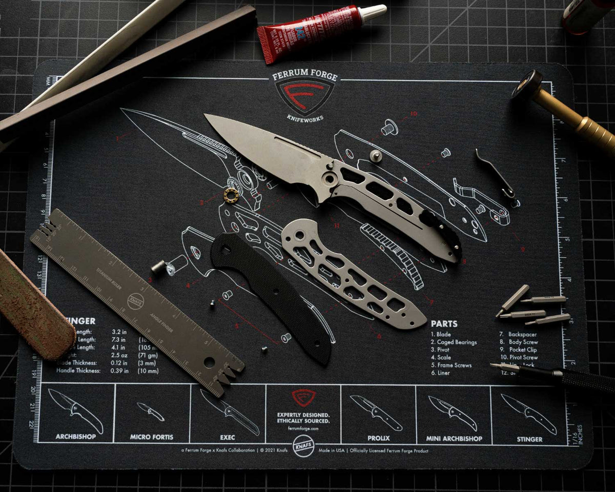 Knafs x Ferrum Forge Stinger Knife Shop Mat with a disassembled knife and screwdriver laid out on top