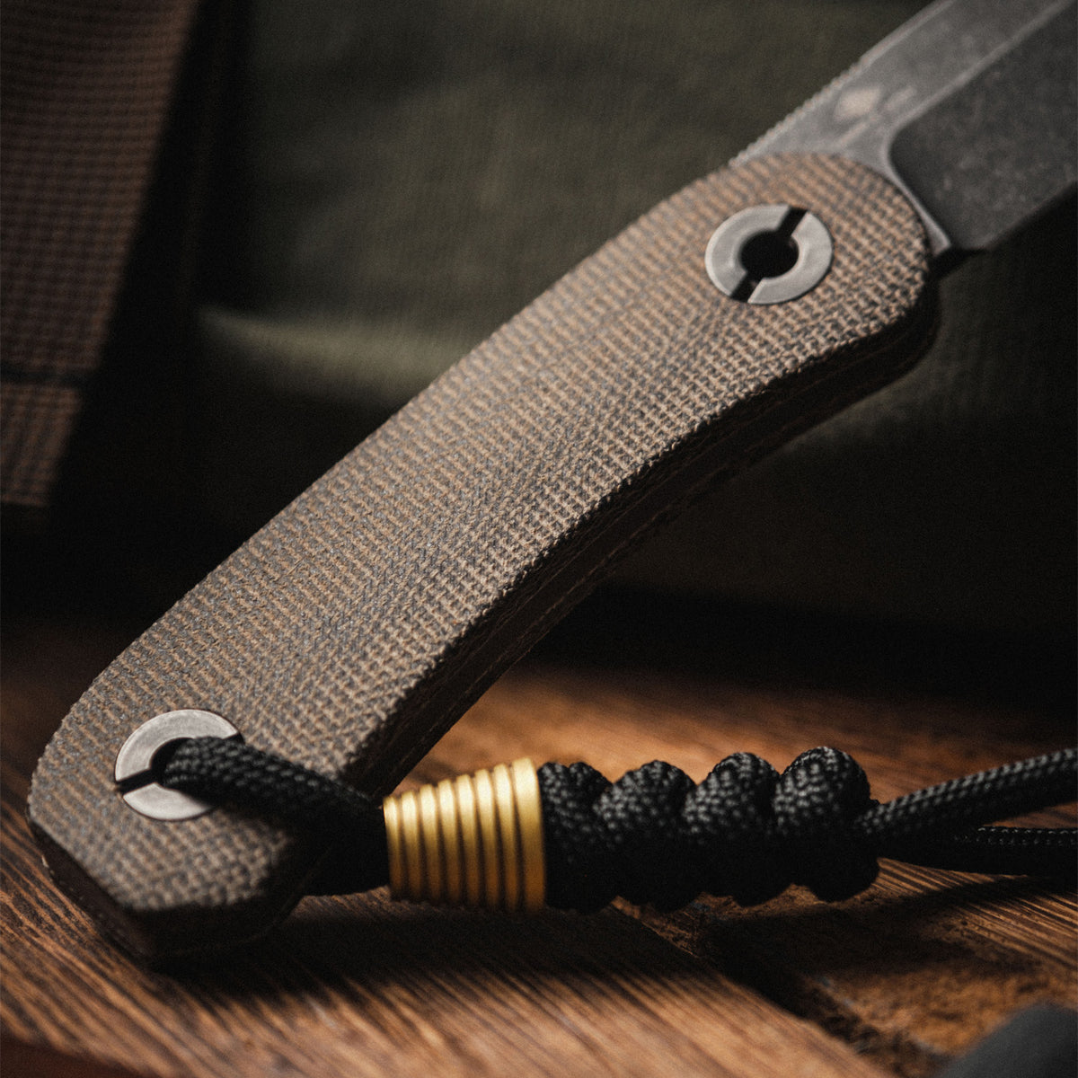 Lander 4 Fixed Blade Knife in Moondust Micarta in its sheath, standalone product shot