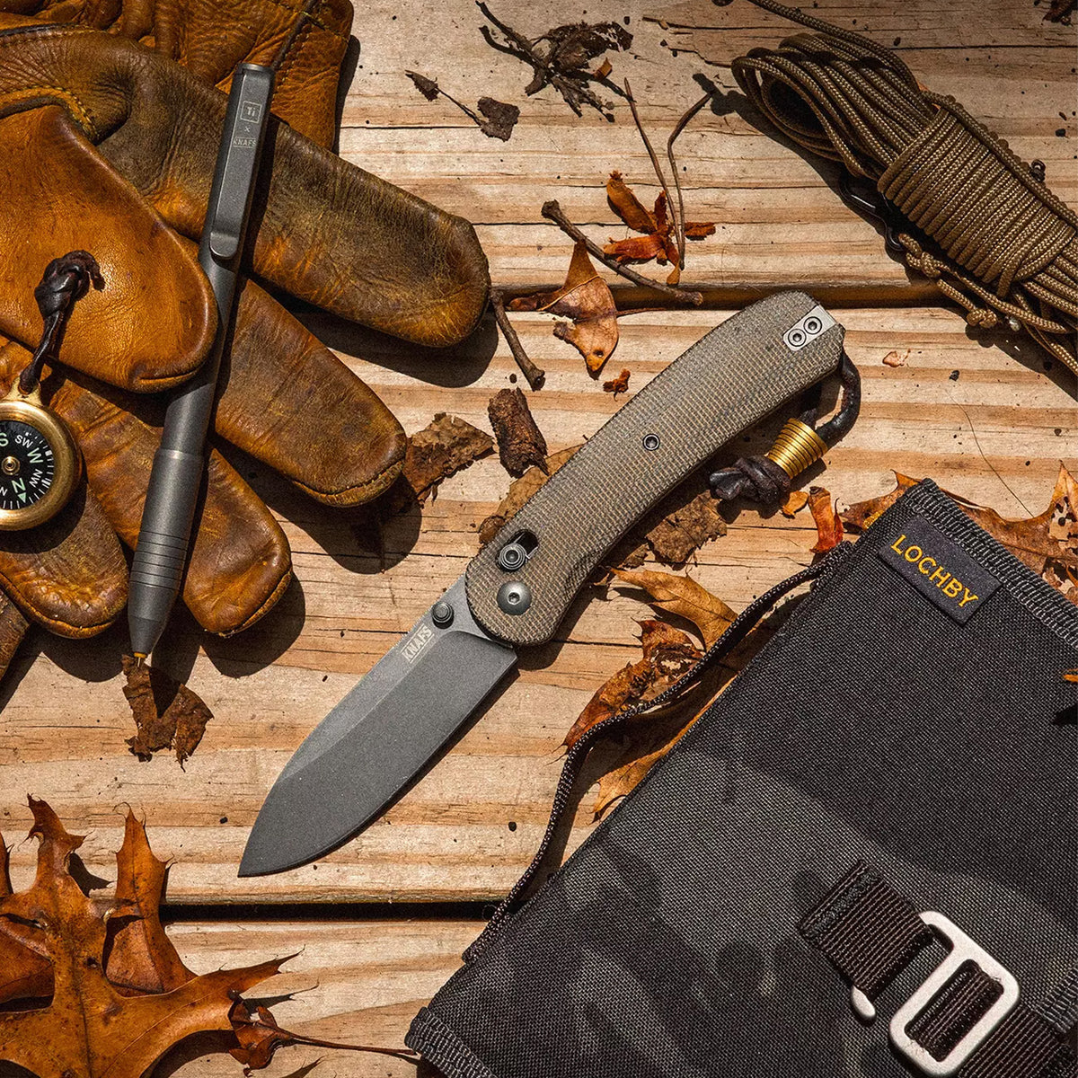 Lander 2 Pocket Knife in Moondust Micarta, open, held in hand, alternate angle