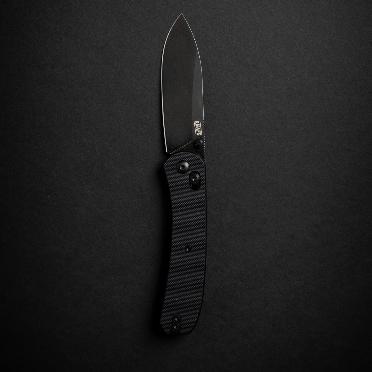 Lander 2 Pocket Knife in Black G10, closed, standalone product shot on dark background