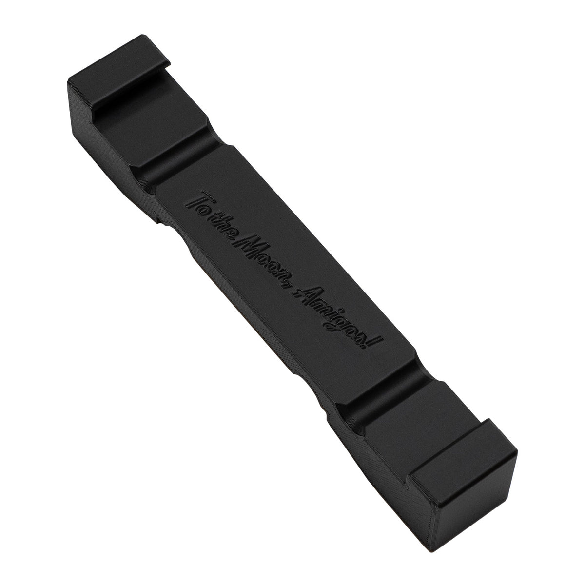 Docking Station sharpening guide accessory, black silicone strip, back view