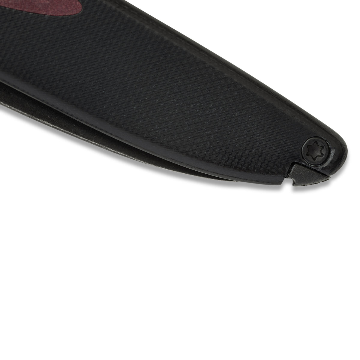 Close-up of Doodler pocket knife pen mechanism partially extended, pointed inward