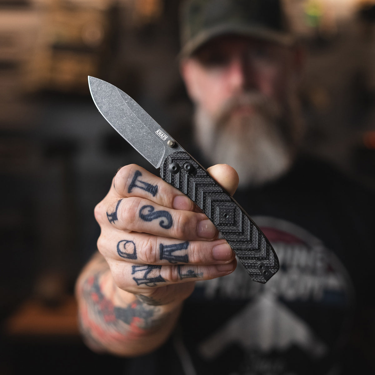 Jeremy Siers collaboration Lander 2 knife with black micarta handle, closed, square product shot