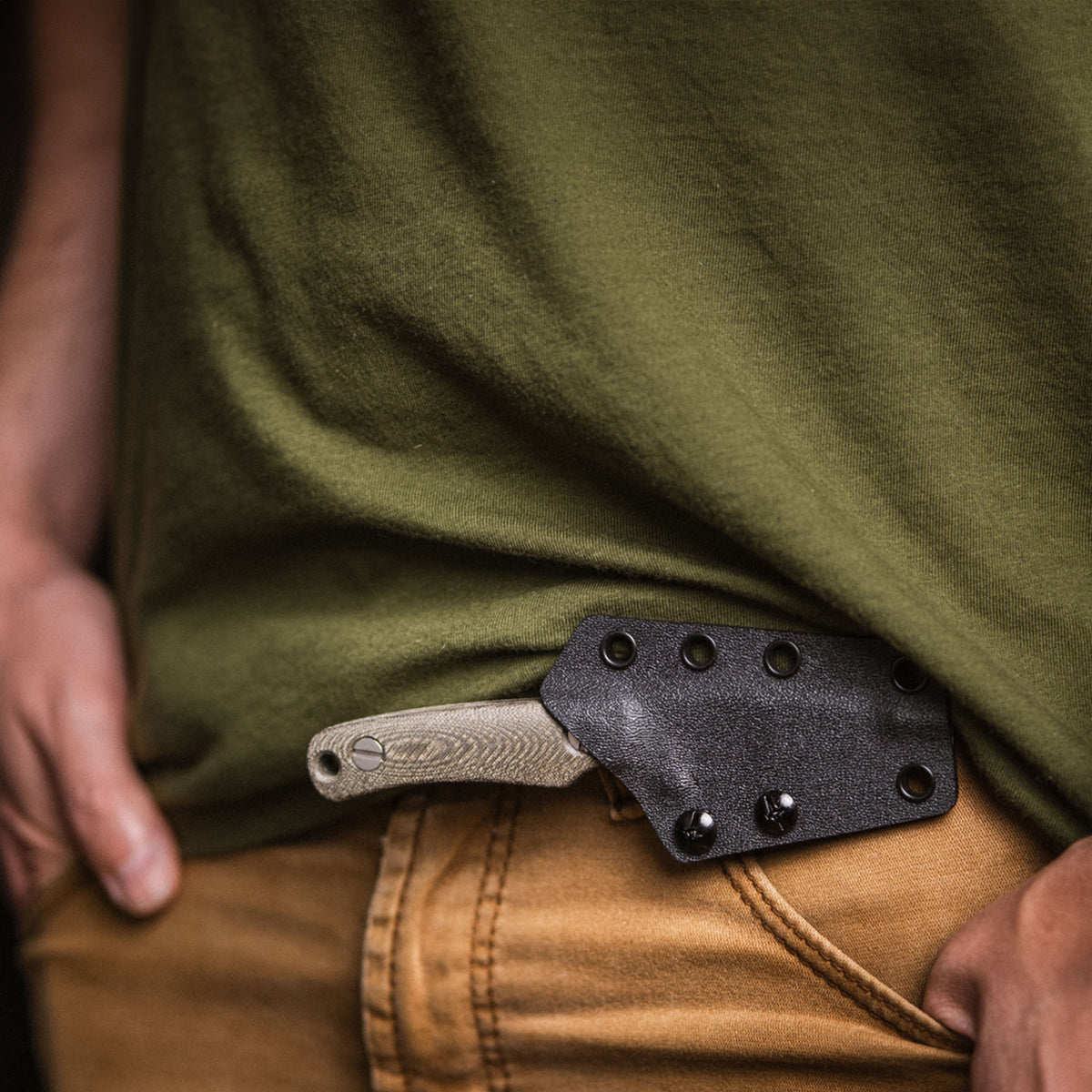 Little Lulu knife in sheath worn in appendix carry position on waistband