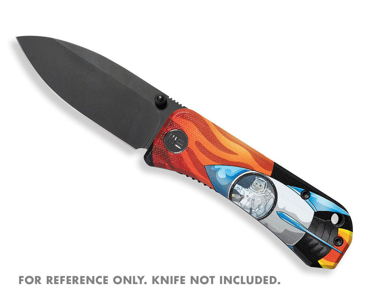 Mars Kitty Banter Scales Version 2.0 on an open folding knife with black blade, front view (reference image, knife not included)