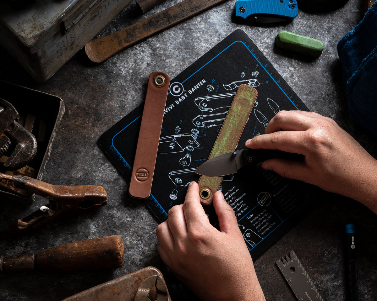 CIVIVI Shop Mat mouse pad shown in use with a leather strop and stropping compound