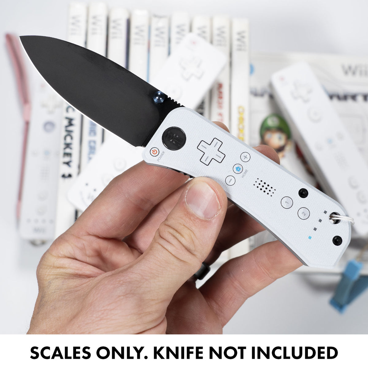 Close-up of WEii Banter Scales on an open Banter knife held in hand (scales only, knife not included)